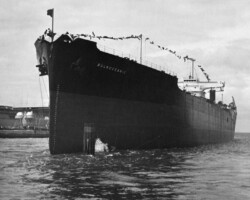<em>Bulkoceanic</em> floating just moments after being launched. In the left background are 2 light aircraft carriers.
( Photo Copyright Thomas Fred Wright Jr. )